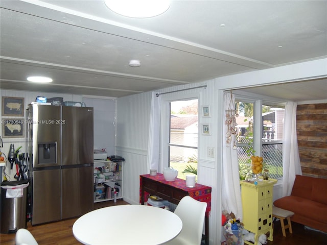 dining area with dark hardwood / wood-style floors