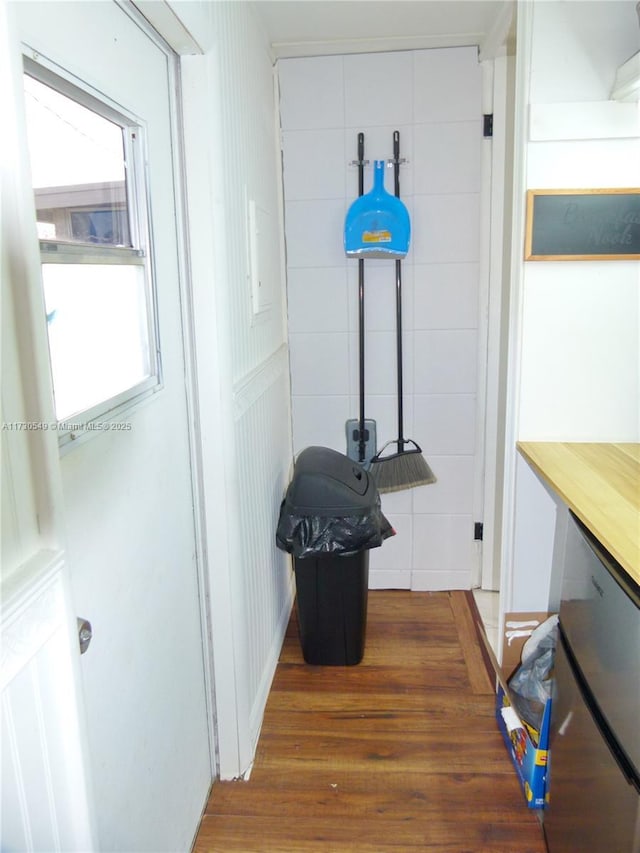 hallway featuring dark hardwood / wood-style flooring