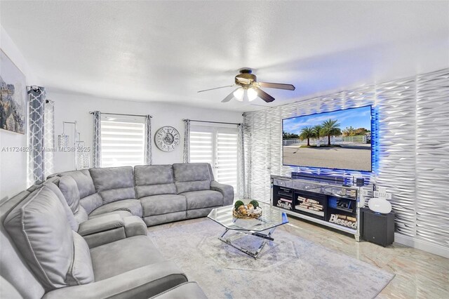 living room featuring ceiling fan