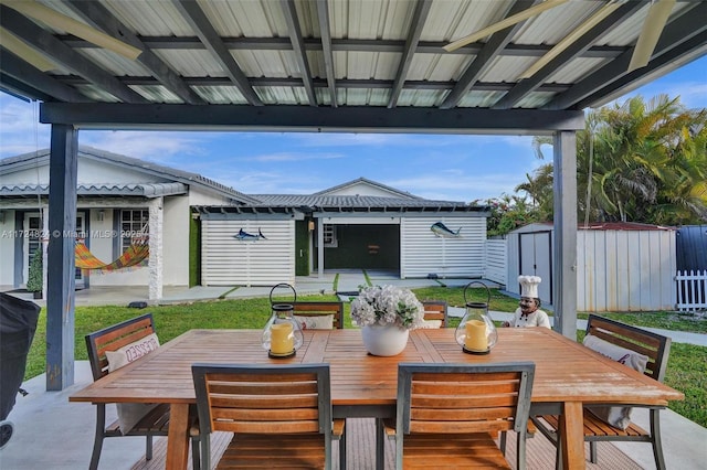 view of patio with a storage unit