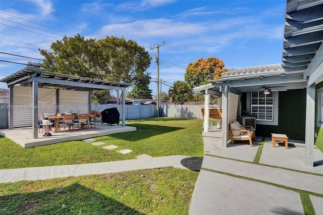 view of yard featuring a patio and a pergola