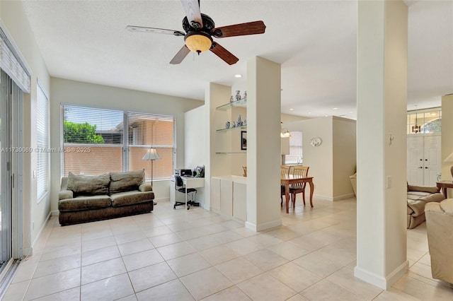 tiled living room with built in shelves