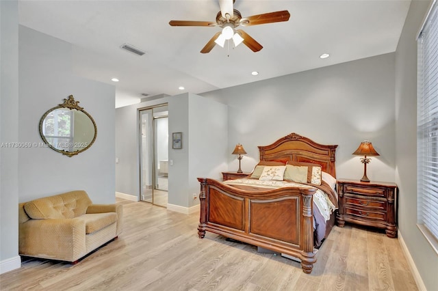 bedroom featuring light wood-type flooring and ceiling fan