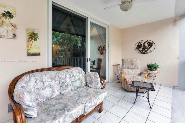 interior space with ceiling fan