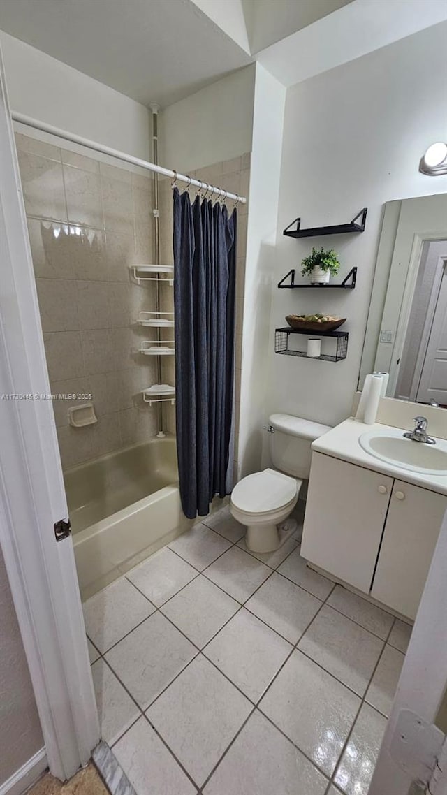 full bathroom with vanity, toilet, shower / bathtub combination with curtain, and tile patterned flooring