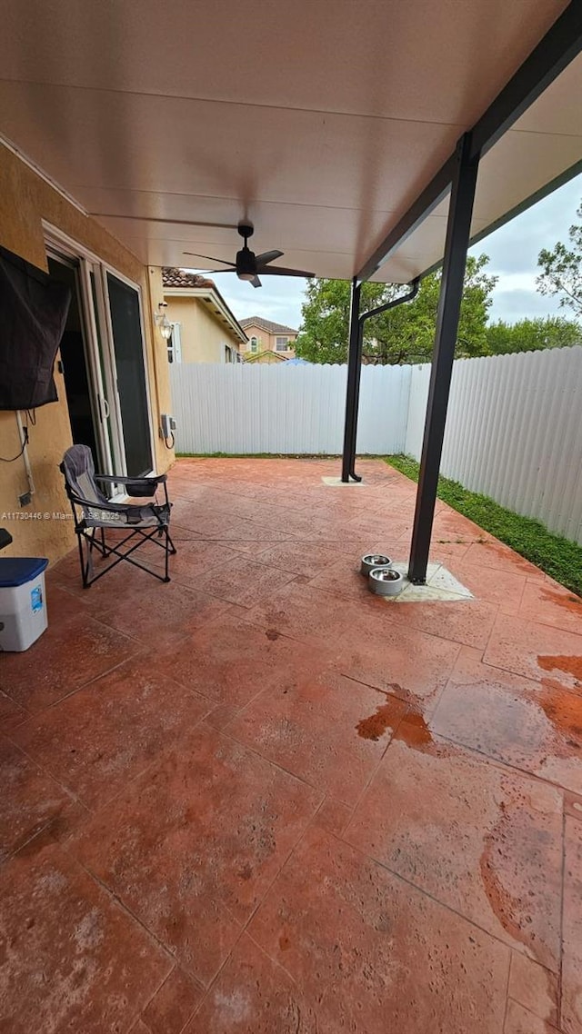 view of patio with ceiling fan