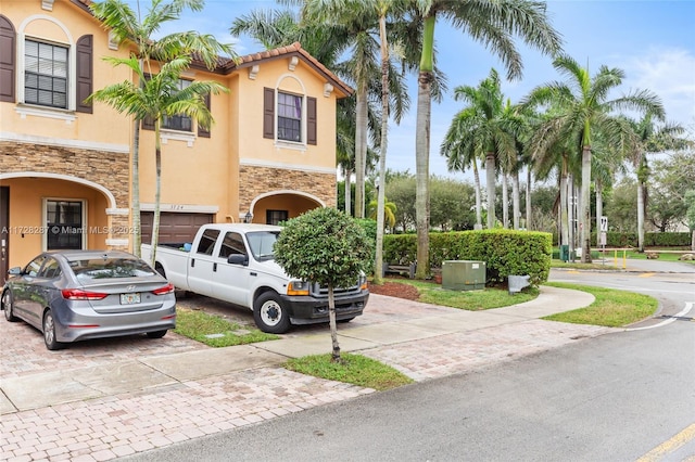 view of front of home with a garage