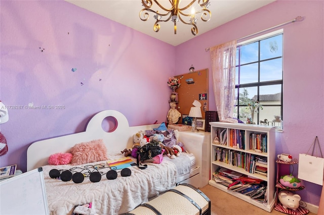 bedroom with carpet flooring and an inviting chandelier