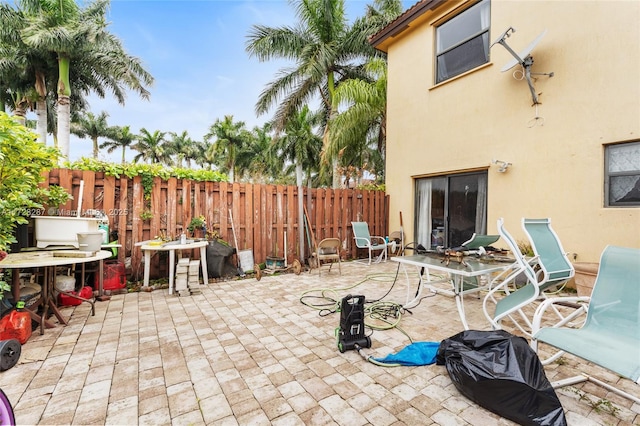 view of patio / terrace with ceiling fan