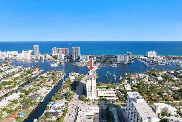 drone / aerial view with a water view