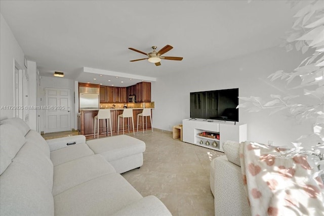 living room featuring ceiling fan