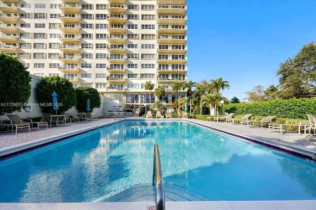 view of swimming pool featuring a patio