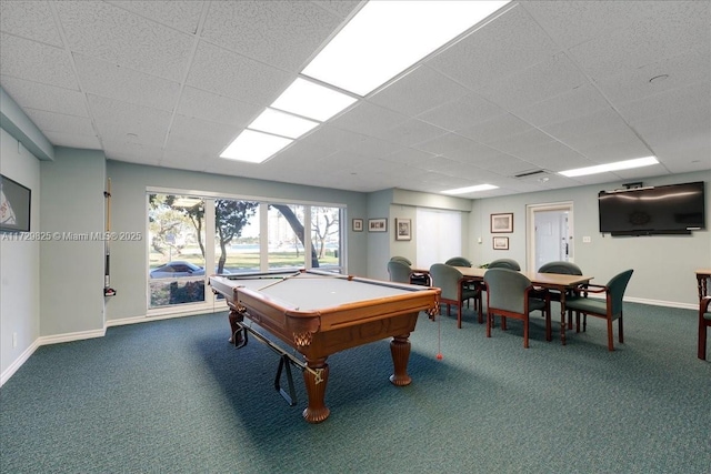 recreation room featuring carpet floors and a drop ceiling