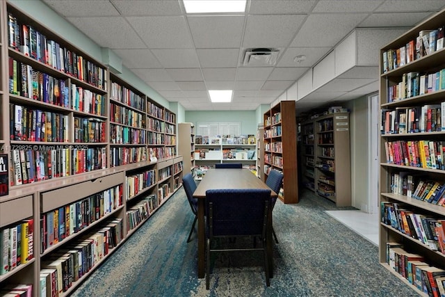 office featuring carpet and a drop ceiling