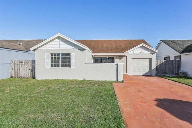 ranch-style house with a garage and a front lawn