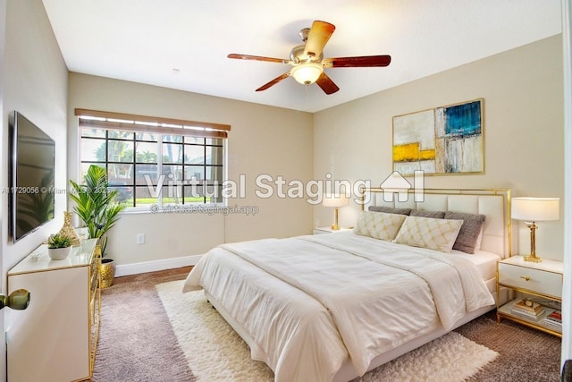 bedroom featuring baseboards, carpet flooring, and ceiling fan