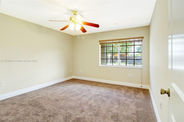 unfurnished room featuring carpet flooring, baseboards, and ceiling fan