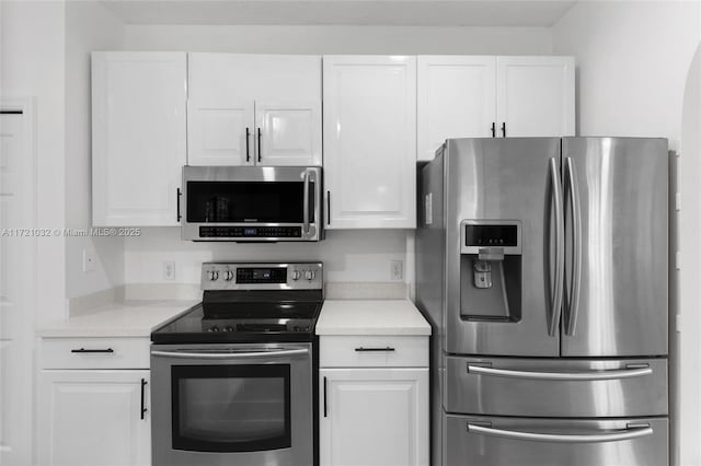 kitchen with white cabinets and stainless steel appliances