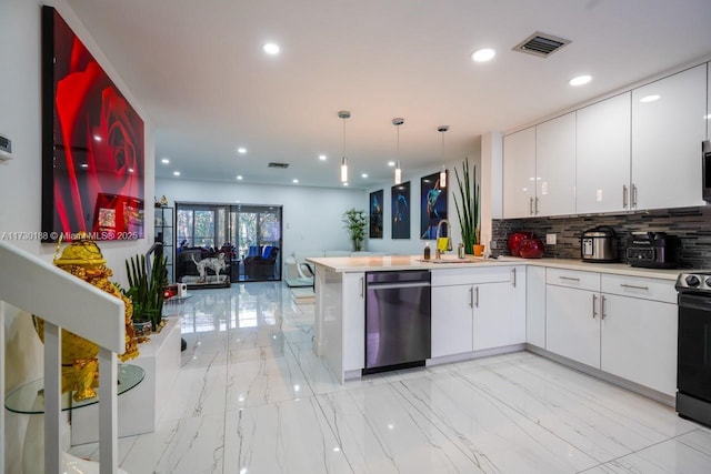 kitchen featuring hanging light fixtures, sink, white cabinets, kitchen peninsula, and stainless steel appliances