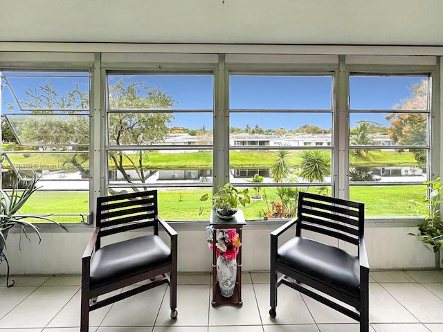 sunroom with a water view