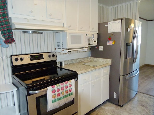 kitchen with white cabinets and appliances with stainless steel finishes