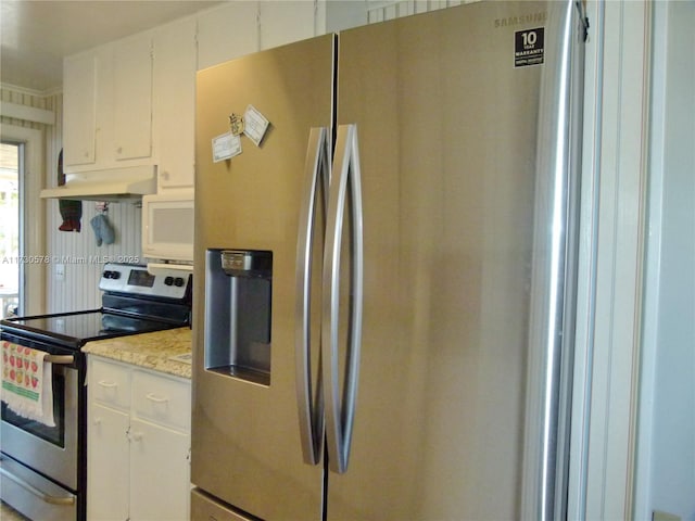 kitchen with white cabinetry and appliances with stainless steel finishes