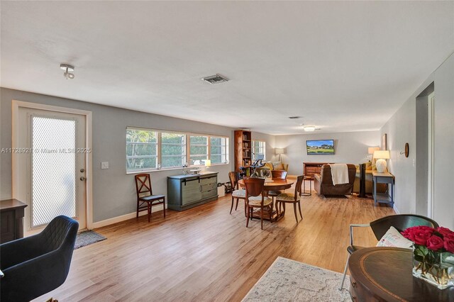 dining room featuring light hardwood / wood-style floors