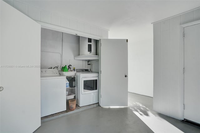 laundry room with independent washer and dryer