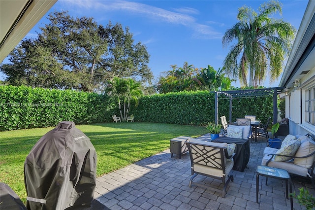 view of patio featuring a grill and outdoor lounge area