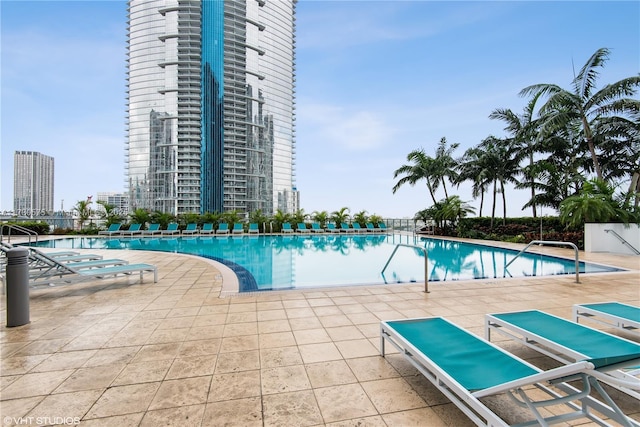 view of swimming pool featuring a patio