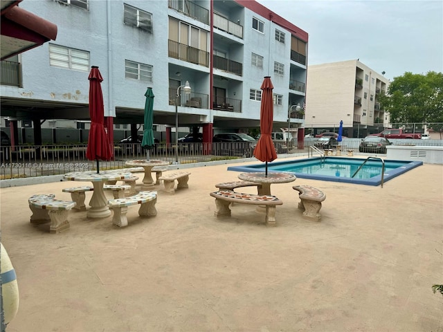 view of pool featuring a patio area