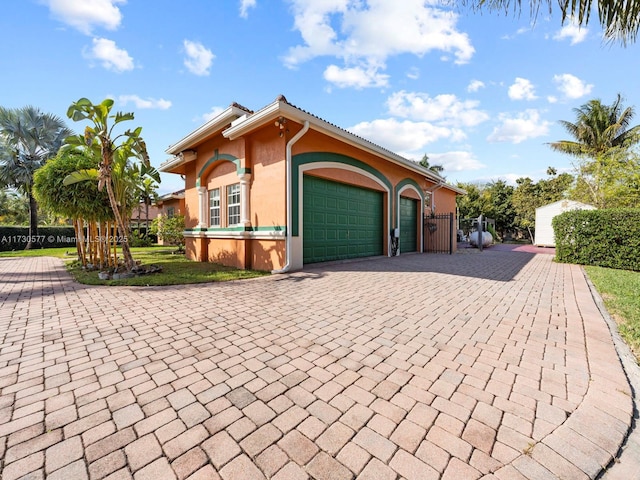 view of front of home featuring a garage