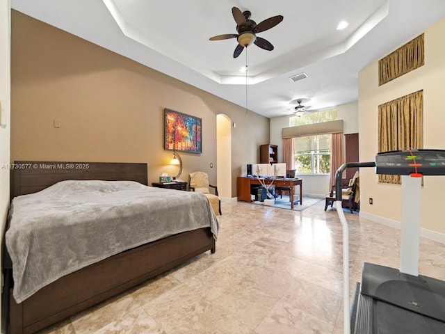 bedroom featuring a tray ceiling