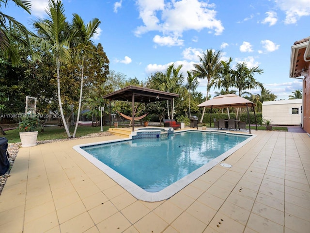 view of pool with a gazebo, an in ground hot tub, and a patio area