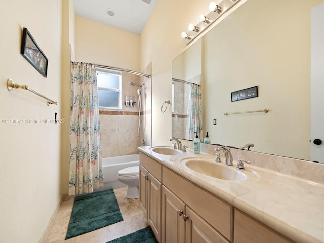 full bathroom with shower / bath combo, vanity, tile patterned floors, and toilet