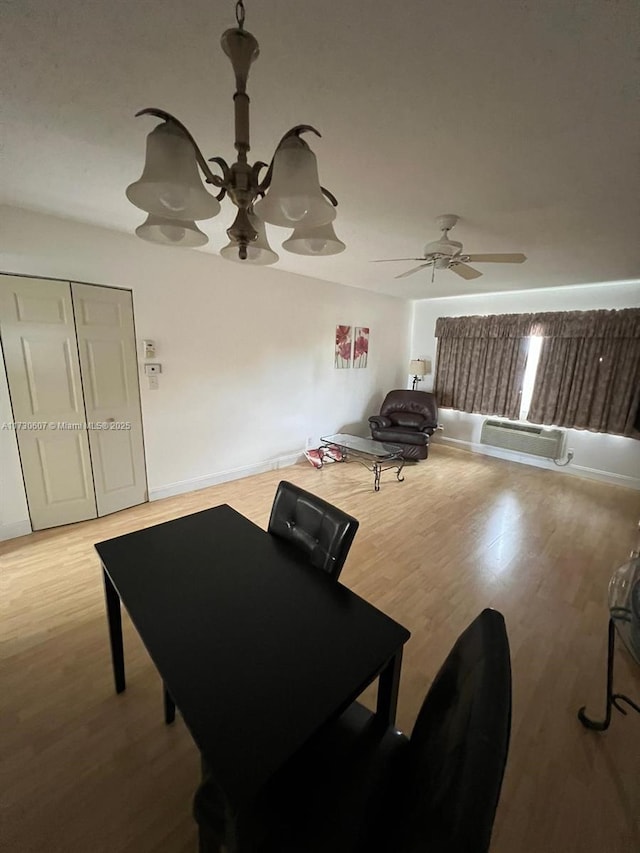 living room featuring light wood-type flooring and ceiling fan