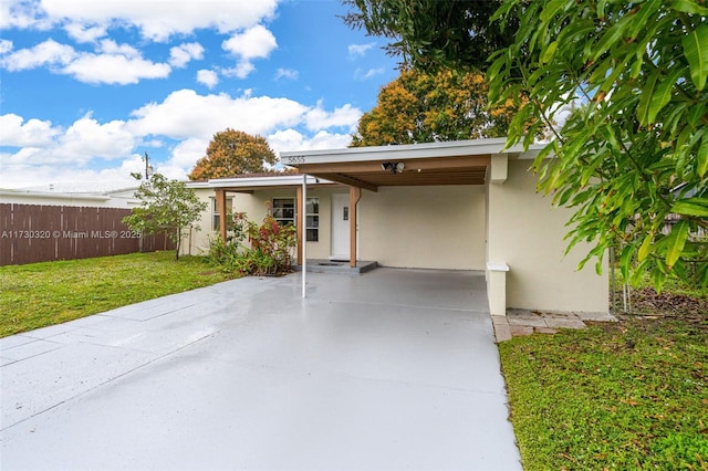 exterior space featuring a carport