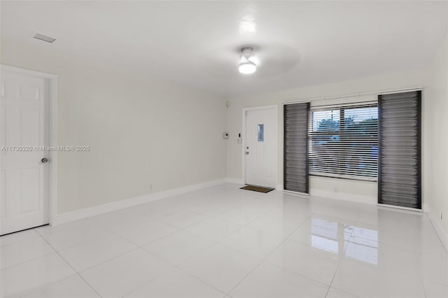 view of tiled spare room