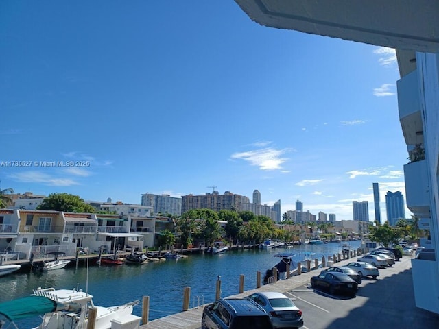 view of water feature with a dock