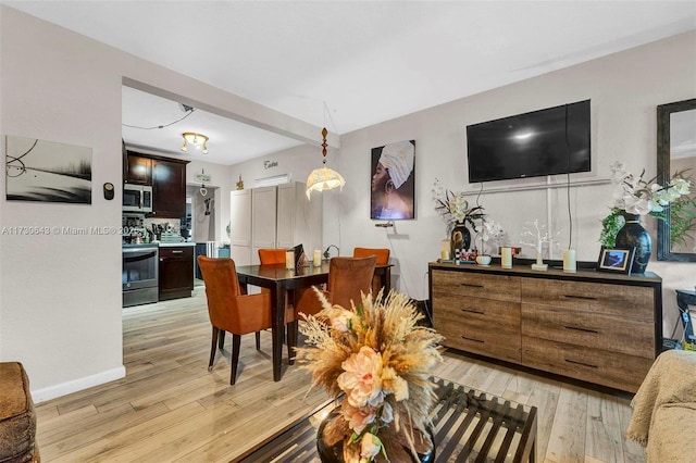 dining area featuring light hardwood / wood-style floors