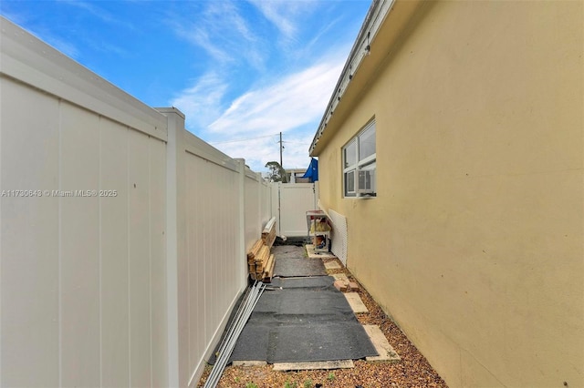 view of property exterior with cooling unit