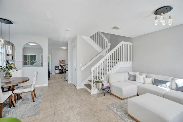 living room with light tile patterned floors