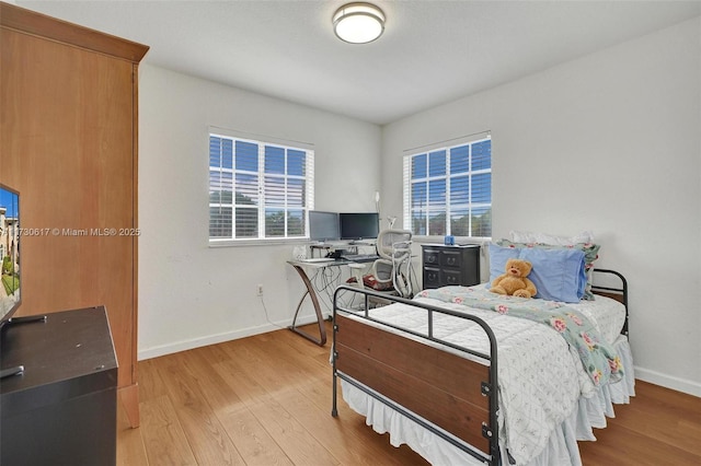 bedroom featuring light hardwood / wood-style flooring