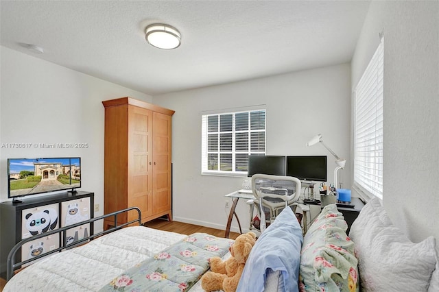 bedroom featuring light hardwood / wood-style flooring