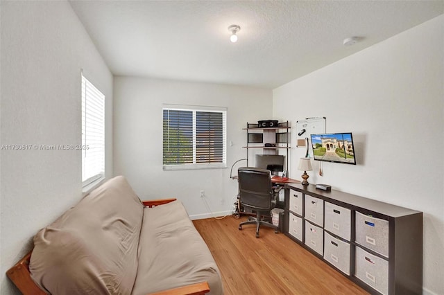 home office featuring light wood-type flooring