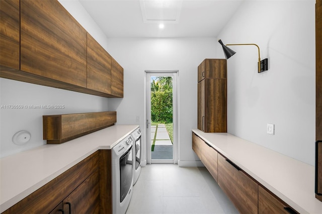 kitchen with independent washer and dryer