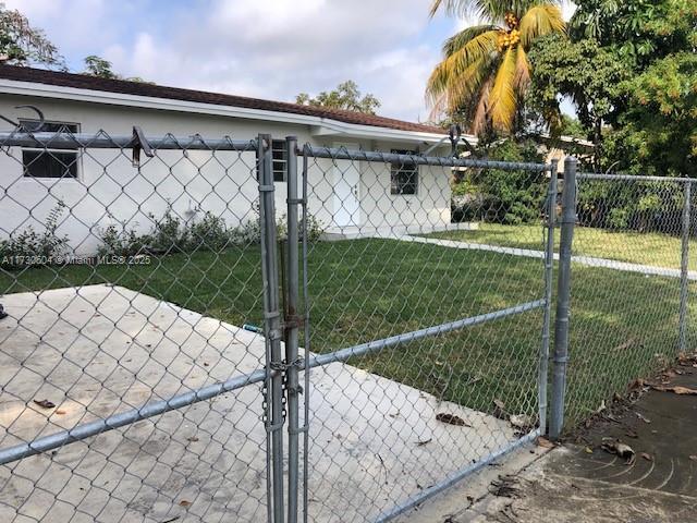 view of property exterior featuring a yard