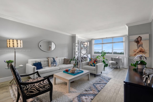 living room featuring light hardwood / wood-style flooring and ornamental molding