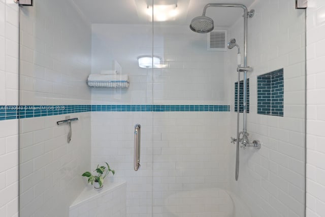 bathroom featuring walk in shower