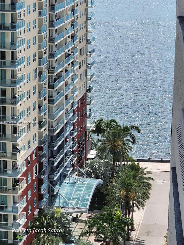 view of building exterior with a water view